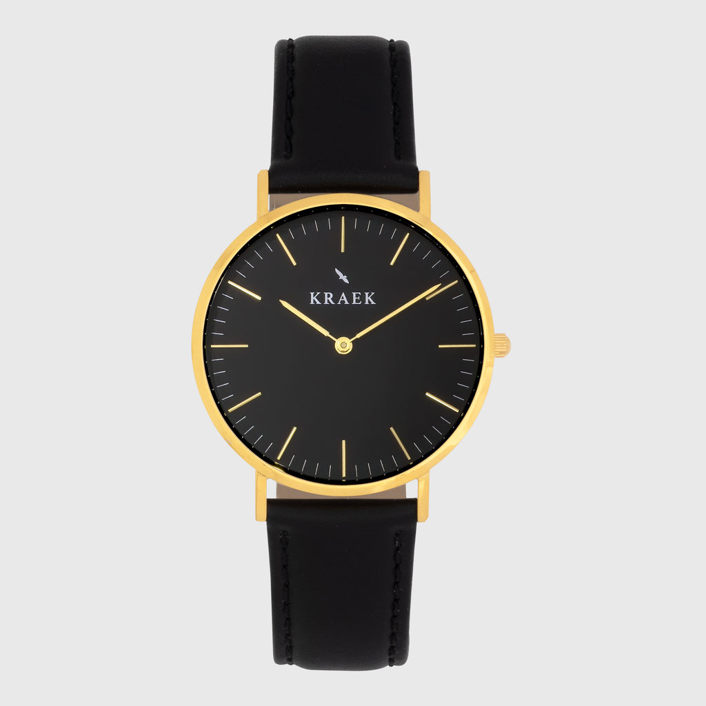 Gold women's watch - black leather strap - black dial - round case - Svelte Kraek