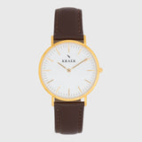 gold women's watch - brown leather strap - white dial - round case - Svelte Kraek