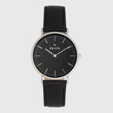 Silver women's watch - black leather strap - black dial - round case - Svelte Kraek